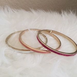 Bundle of three cloisonné bracelets.